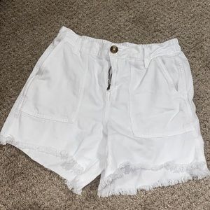 White distressed shorts